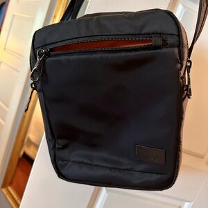 Pacsafe crossbody with interior RFID pocket